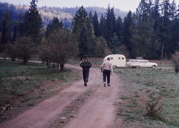 Father and Son Look for Perfect Campsite Father and Son Look for Perfect Campsite