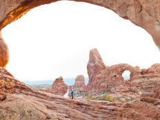 The stunning rock formations create a natural canopy or “chuppah” for couples marrying in Arches. Though the park allows the assembled to celebrate with a cookout afterward, many couples head to a hotel or resort in Moab for their receptions. Photo couresy of Moab photographer Angela Hayes.